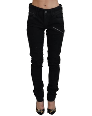 Jeans de mujer ajustados de algodón negro de John Galliano, de cintura media y corte slim.