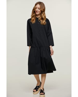 Vestido negro oversize con botones