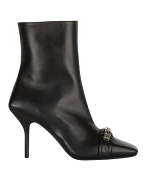 Tacones tipo botin negros con diseo tejido G de Givenchy