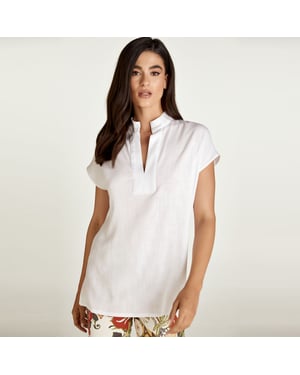 Blusa sin mangas estilo lino blanco