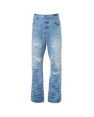 Vaqueros de denim azul índigo desteñido de corte recto con parche Aloha de Amiri