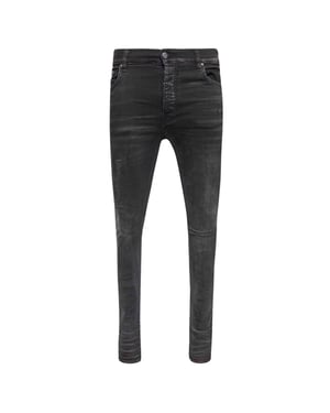 Vaqueros Amiri de corte slim y desgastados con logo Amiri envejecido en denim negro
