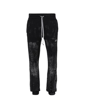 Amiri pantalones deportivos negros con logo teñido agrietado