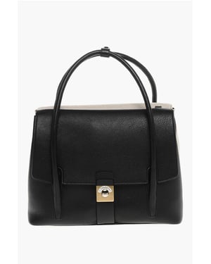 Bolso tote de lona y cuero con correa de hombro ajustable en color negro