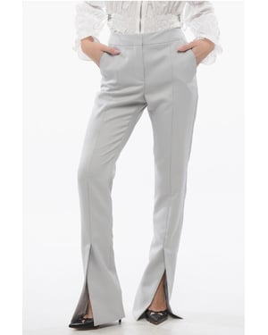 Pantalones CORPORATE TECH con tobillos divididos en gris