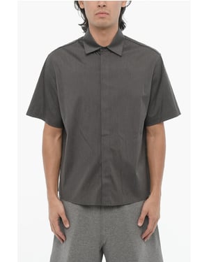 Camisa holgada de manga corta en gris