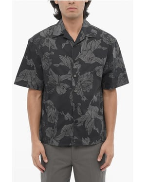 Camisa de corte cuadrado con estampado floral y cierre oculto en gris