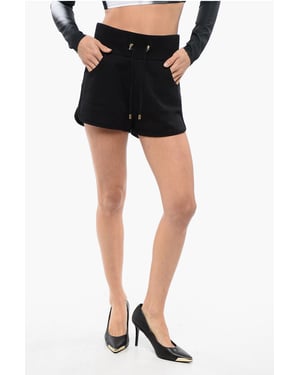 Pantalones cortos multibolsillos de jersey con estampado de logotipo