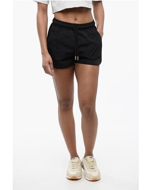 Shorts de nailon CRISPY con banda lateral de malla en negro