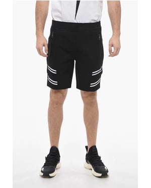 Shorts universitarios holgados de cintura baja con inserciones elásticas en negro