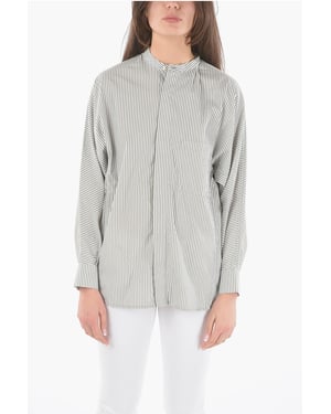 Camisa oversize a rayas con bolsillo en el pecho en gris