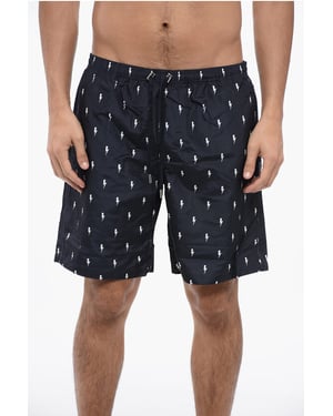 PANTALONES CORTOS DE BAÑO CON MICROPERNOS EN TODO EL EXTREMO