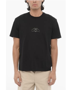 Camiseta de algodón con cuello redondo y estampado en color negro