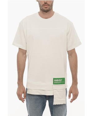 Camiseta de cuello redondo de color liso con bolsillo en la cintura en blanco