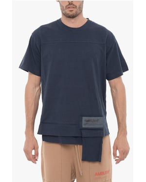 Camiseta de cuello redondo de color liso con bolsillo en la cintura en azul