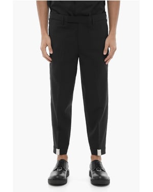 Pantalones negros ajustados de tiro bajo