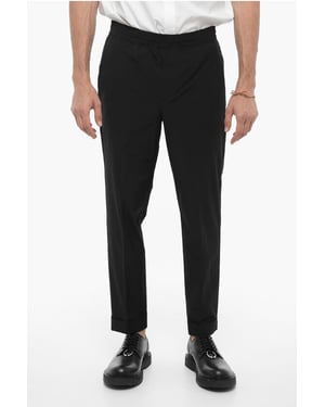 Pantalones de nailon REM con cintura elástica en color negro