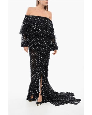 Vestido largo negro con flecos y lunares, hombros descubiertos