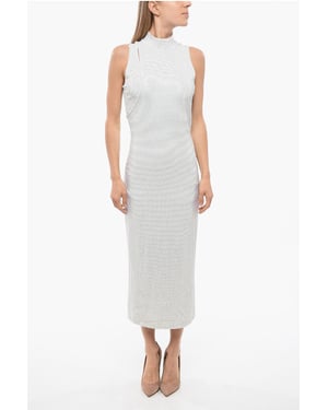 Minivestido gris con capas y pedrería