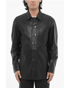 Camisa de cuero y algodón con abotonadura frontal en color negro