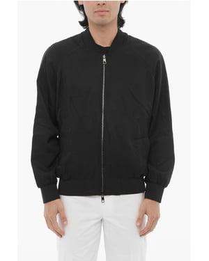 Chaqueta bomber ligera reversible en blanco y negro