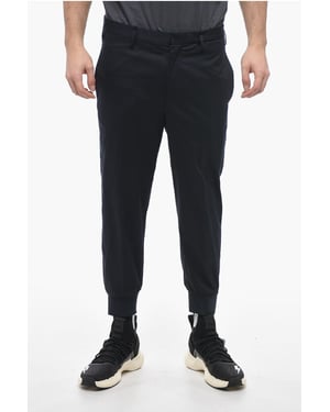 Pantalones JACK de tiro bajo y corte ajustado con puños en azul