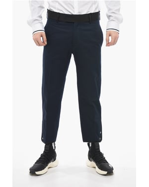 Pantalones TOM Slim Fit con bordes en contraste y botones en los tobillos en azul