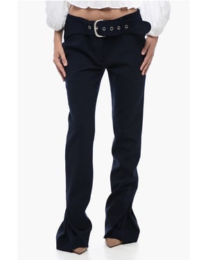 Pantalones de cintura baja con detalle plisado en azul medianoche