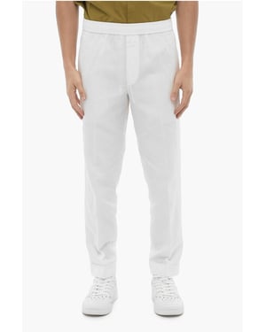 Pantalones REM de corte entallado con cintura elástica en color blanco