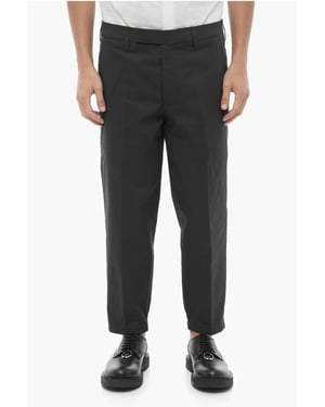 Pantalones ajustados de cintura regular con trabillas para cinturón en negro