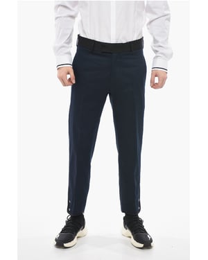 Pantalones TOM Slim Fit con bordes en contraste y botones en los tobillos en azul