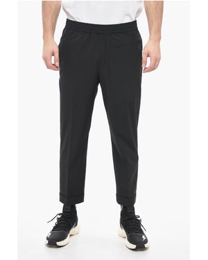 Pantalones de nailon REM con cintura elástica en color negro