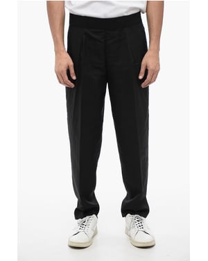Pantalones de mezcla de lino de corte cónico con doble pliegue en negro
