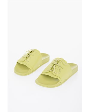 Sandalias de goma con detalle de cordones en verde