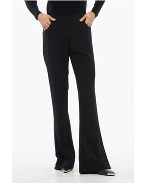 Pantalones acampanados con banda lateral de pedrería en negro