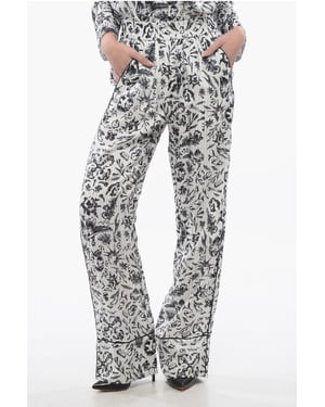 Pantalones Palazzo de pijama de satén con estampado de tatuajes en blanco y negro