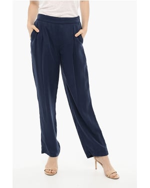 Pantalones acampanados de un solo pliegue en azul