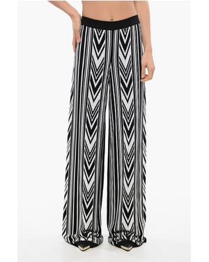 Pantalones anchos con estampado geométrico en blanco y negro