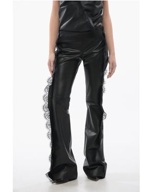 Pantalones de cuero con detalles de encaje en negro