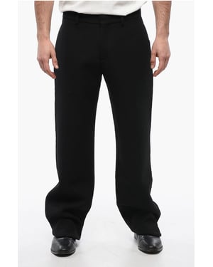 Pantalones rectos de lana en color negro