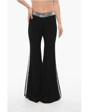 Pantalones acampanados con bandas laterales de lentejuelas en negro