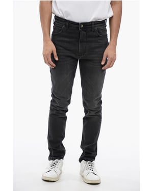 Vaqueros ajustados NICK lavados a la piedra de 14 cm en negro