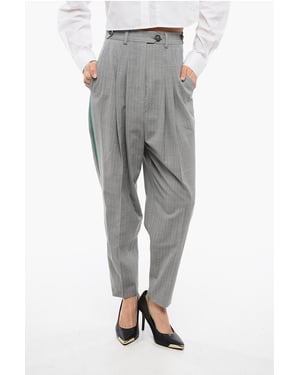 Pantalones harén plisados ​​NEVAL en gris
