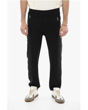 Joggers ajustados con estampado de rayos laterales en negro