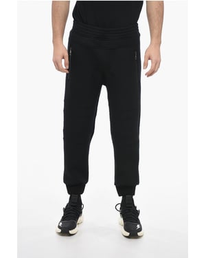 Pantalones deportivos ajustados de neopreno para motociclistas en negro