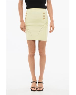 Minifalda de punto con diseño cruzado en amarillo