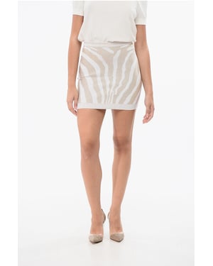 Minifalda de lúrex ZEBRA con cremallera trasera en dorado