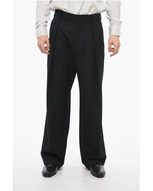 Pantalones anchos de lana con pliegues delanteros en negro