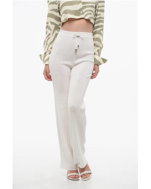 Pantalones de lana virgen acanalados de cintura alta en blanco