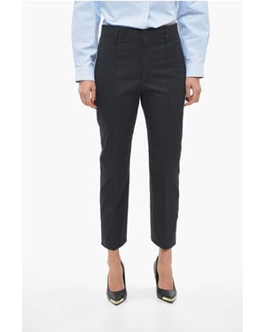 Pantalones de sarga de algodón con corte cónico en azul